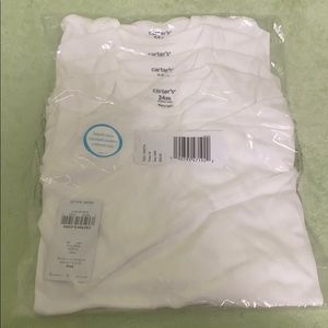Carter’s 4 piece / long sleeve onesies